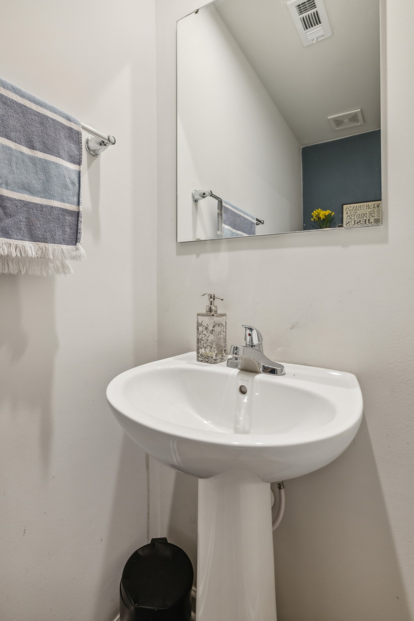 1718 Quail Run Way Spring Hill Spring Hill, TN 37174 - Photo 16 of 40 a bathroom with a sink and a mirror