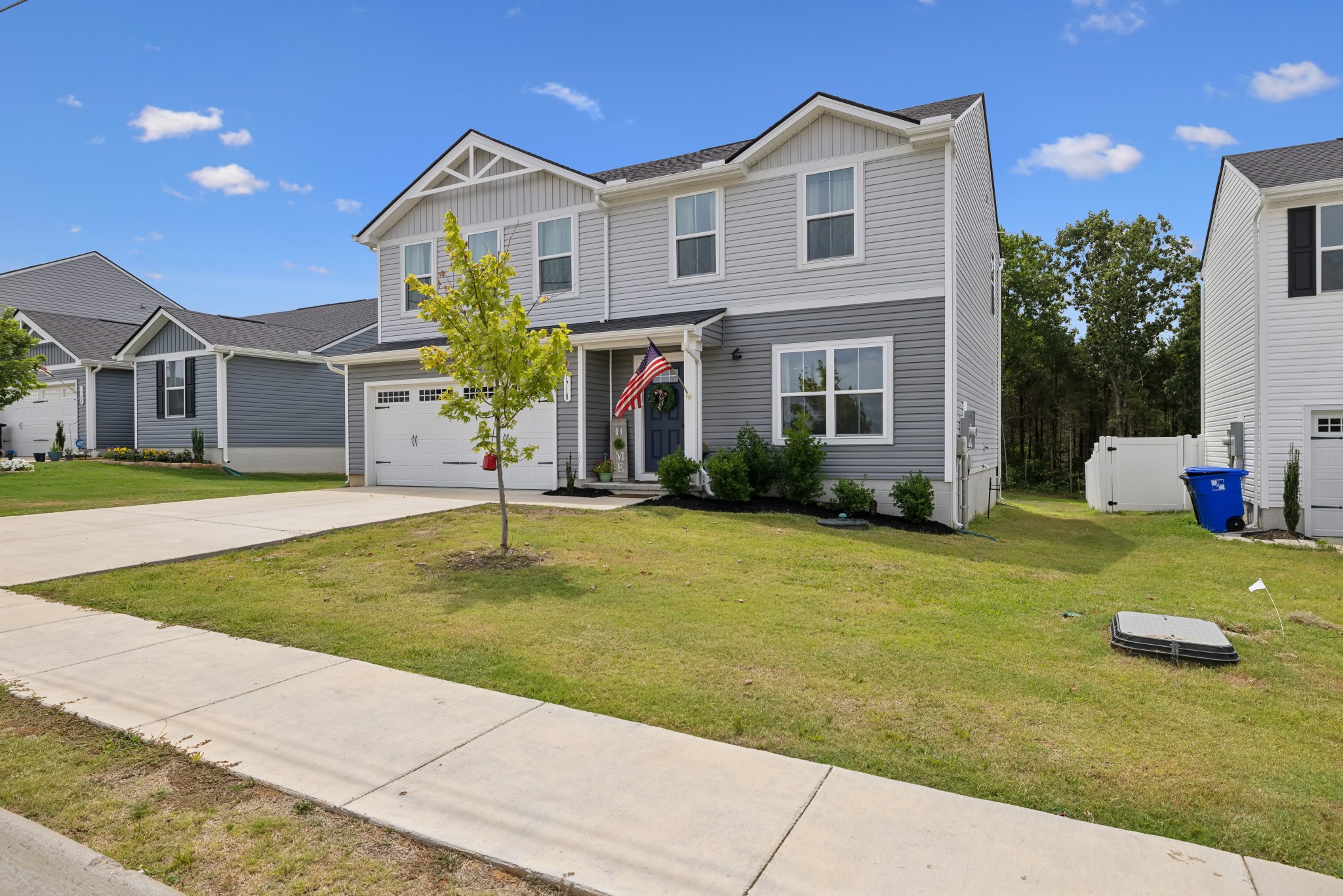 1718 Quail Run Way Spring Hill Spring Hill, TN 37174 - Photo 2 of 40 a front view of a house with a yard