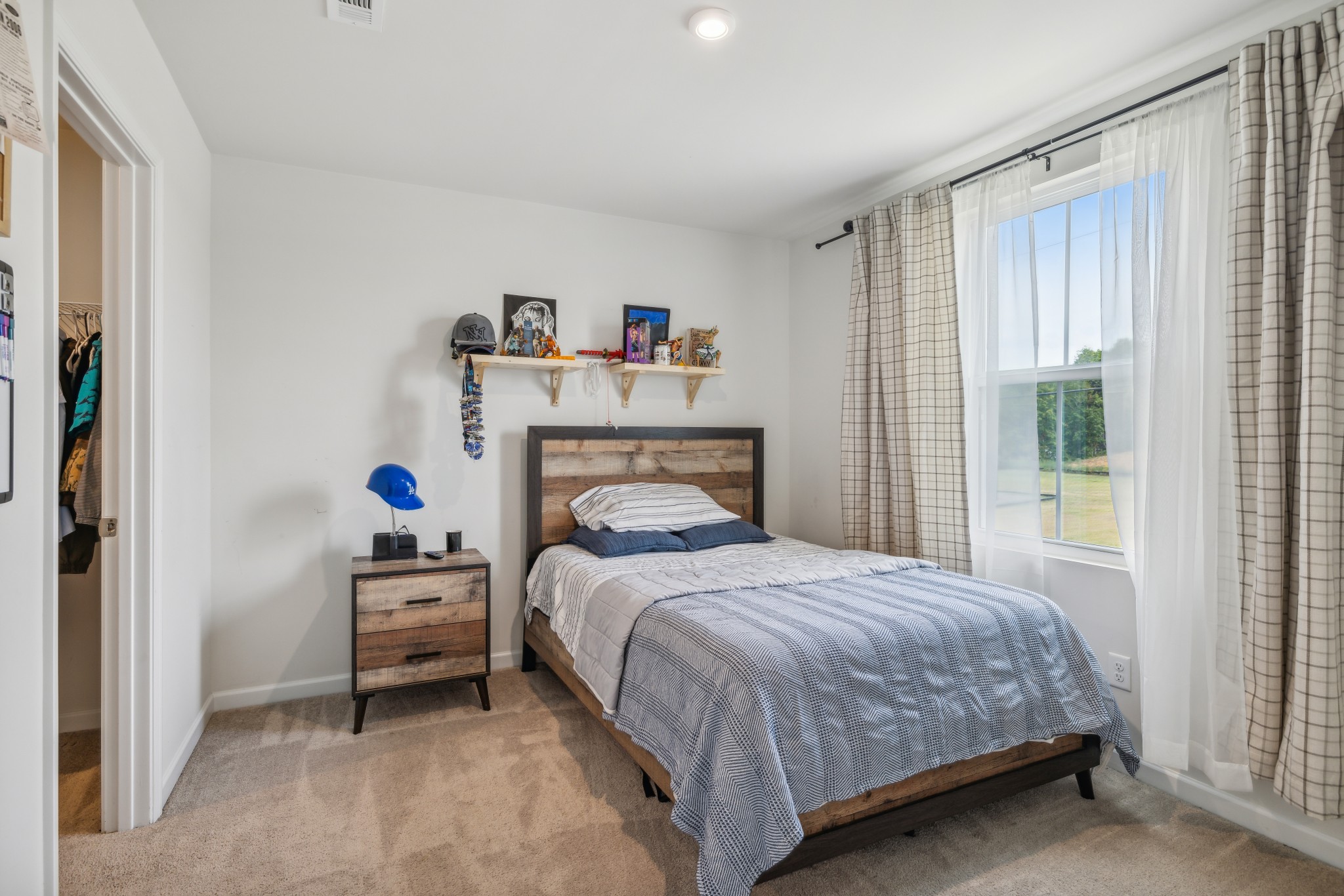 1718 Quail Run Way Spring Hill Spring Hill, TN 37174 - Photo 26 of 40 a bedroom with a bed and a window