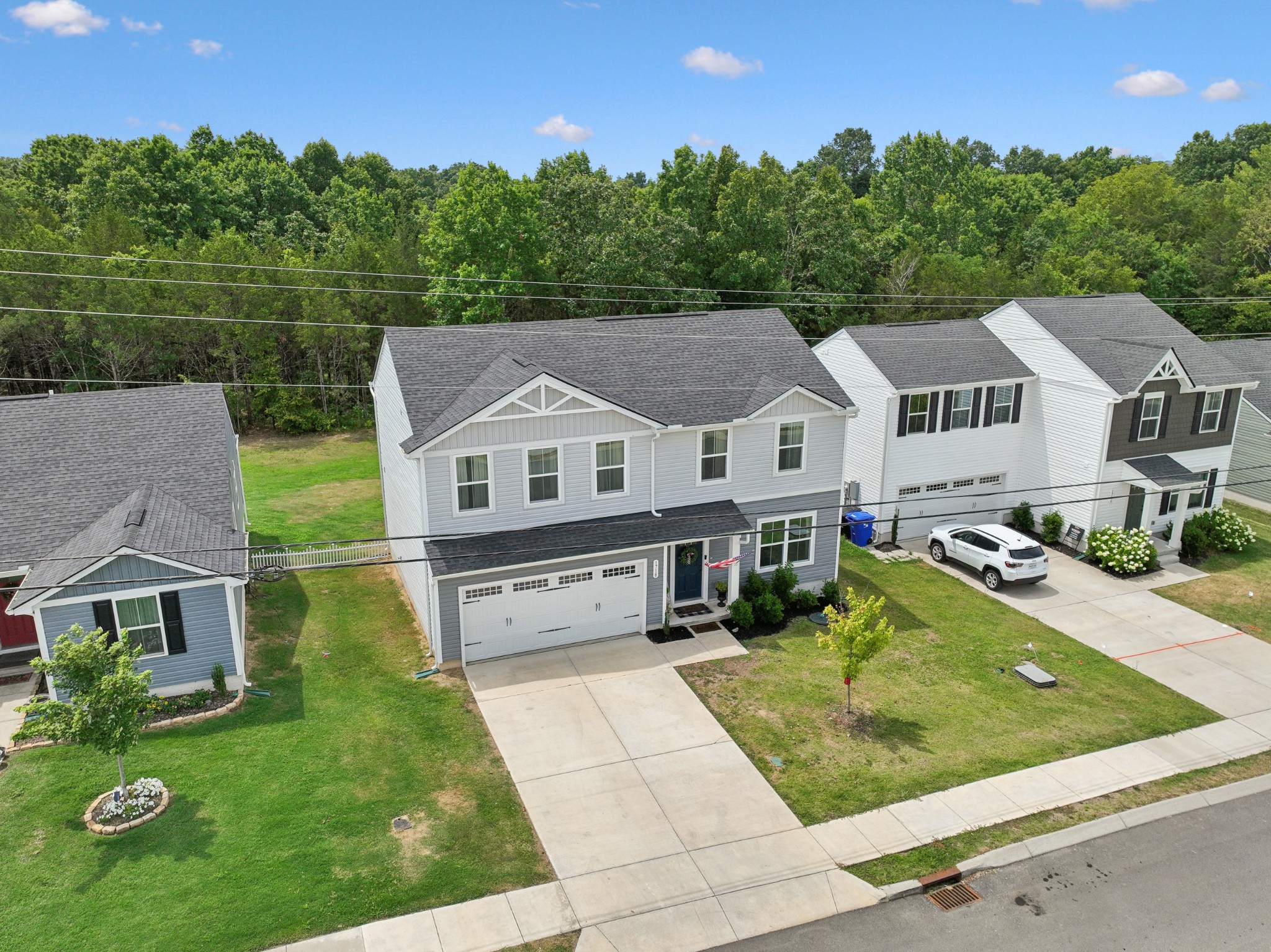 1718 Quail Run Way Spring Hill Spring Hill, TN 37174 - Photo 37 of 40 an aerial view of a house with swimming pool and a yard