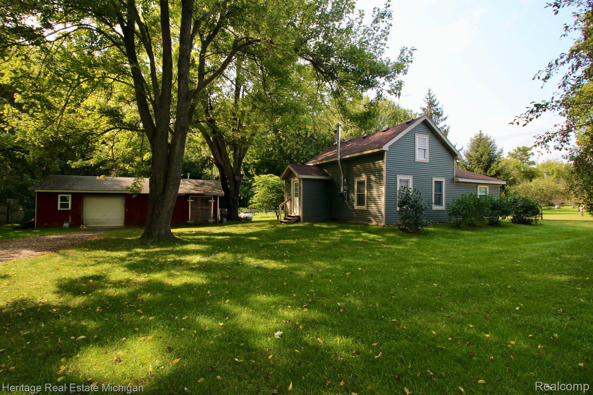 11909 South Nicholson Road Perry, MI 48872 - Photo 22 of 39 Front view of home