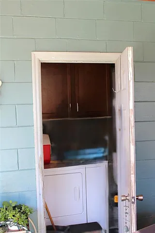 a view of storage and utility room