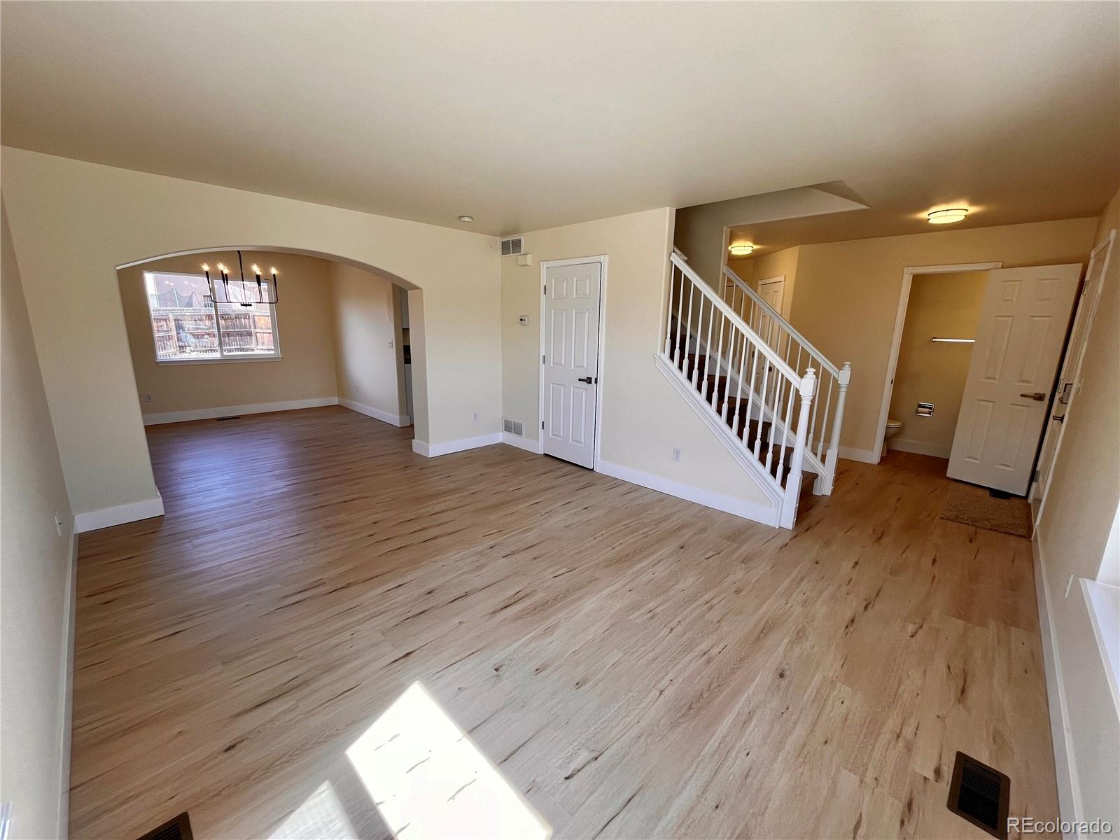 4660 Skylark Road Colorado Springs, CO 80916 - Photo 22 of 33 wooden floor in a hall with an entryway