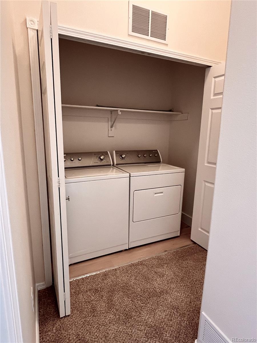 4660 Skylark Road Colorado Springs, CO 80916 - Photo 23 of 33 a utility room with washer and dryer