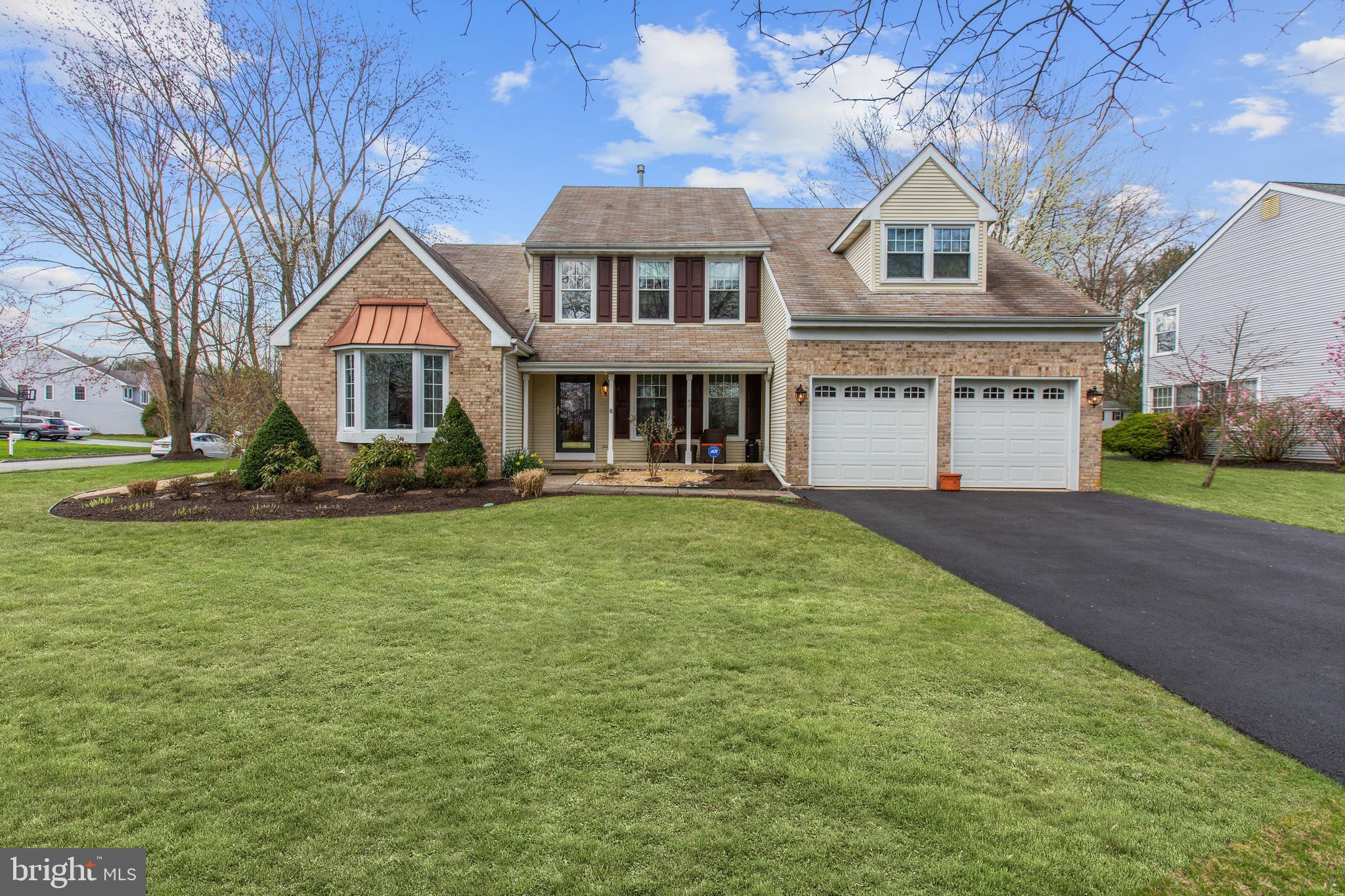 2 Burke Drive Medford, NJ 08055 - Photo 2 of 38 a front view of a house with a yard and trees