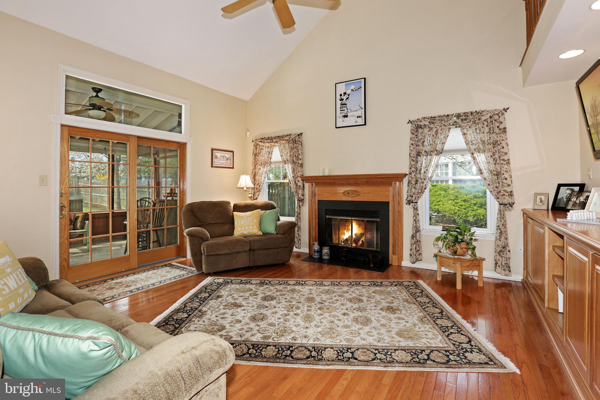 2 Burke Drive Medford, NJ 08055 - Photo 16 of 38 a living room with furniture and a fireplace