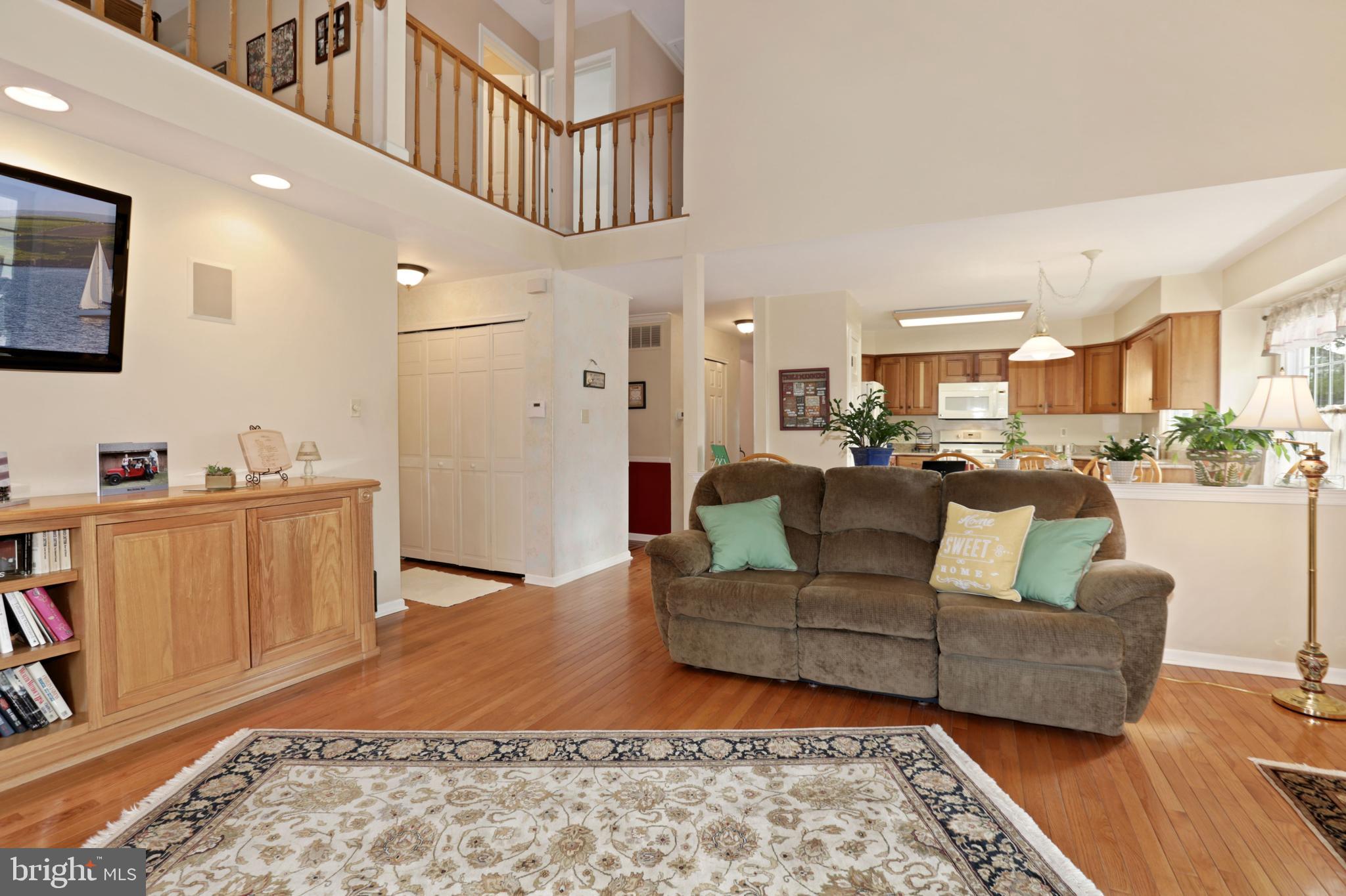 2 Burke Drive Medford, NJ 08055 - Photo 18 of 38 a living room with furniture and kitchen view