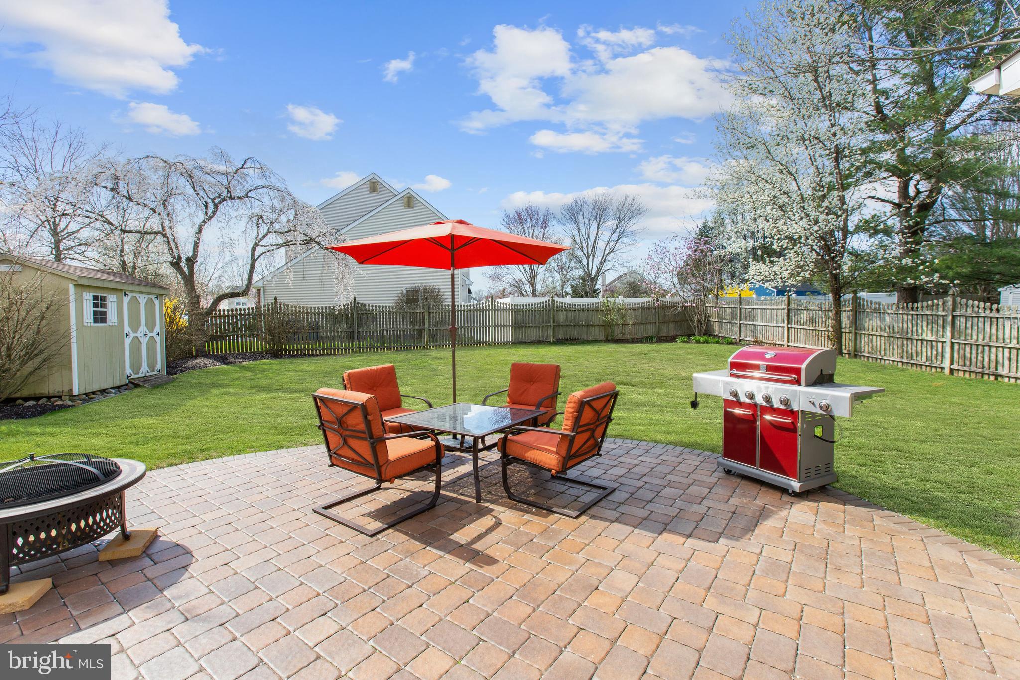 2 Burke Drive Medford, NJ 08055 - Photo 22 of 38 an outdoor sitting area with furniture and garden