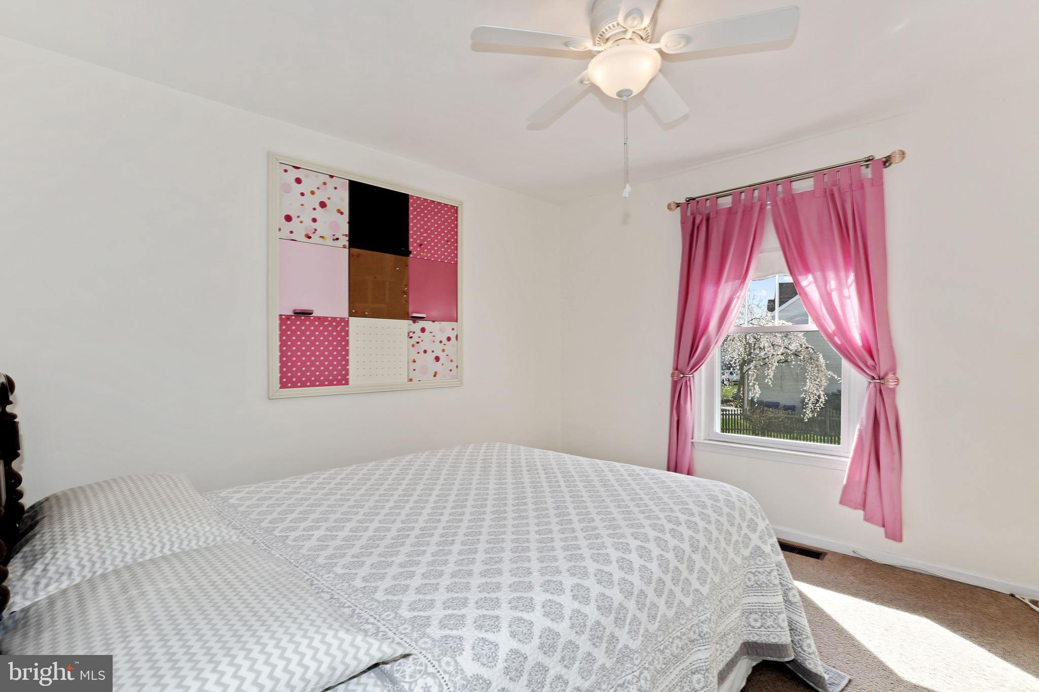 2 Burke Drive Medford, NJ 08055 - Photo 26 of 38 a bedroom with a bed and a window