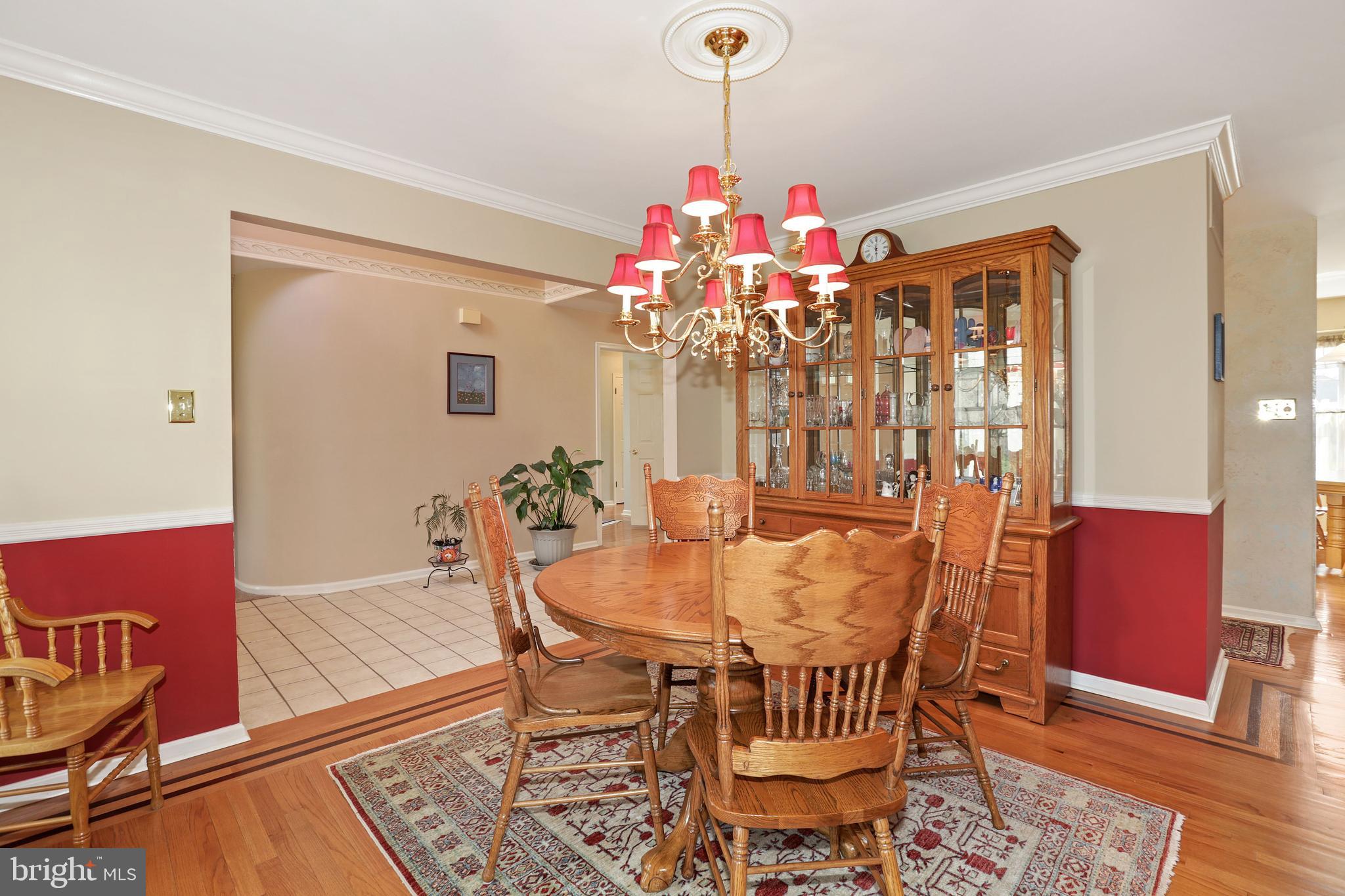 2 Burke Drive Medford, NJ 08055 - Photo 8 of 38 a view of a dining room with furniture and wooden floor