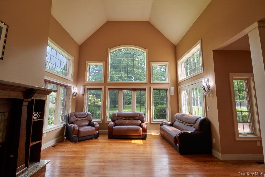 637 South Mountain Road New City, NY 10956 - Photo 12 of 36 a living room with furniture and a large window