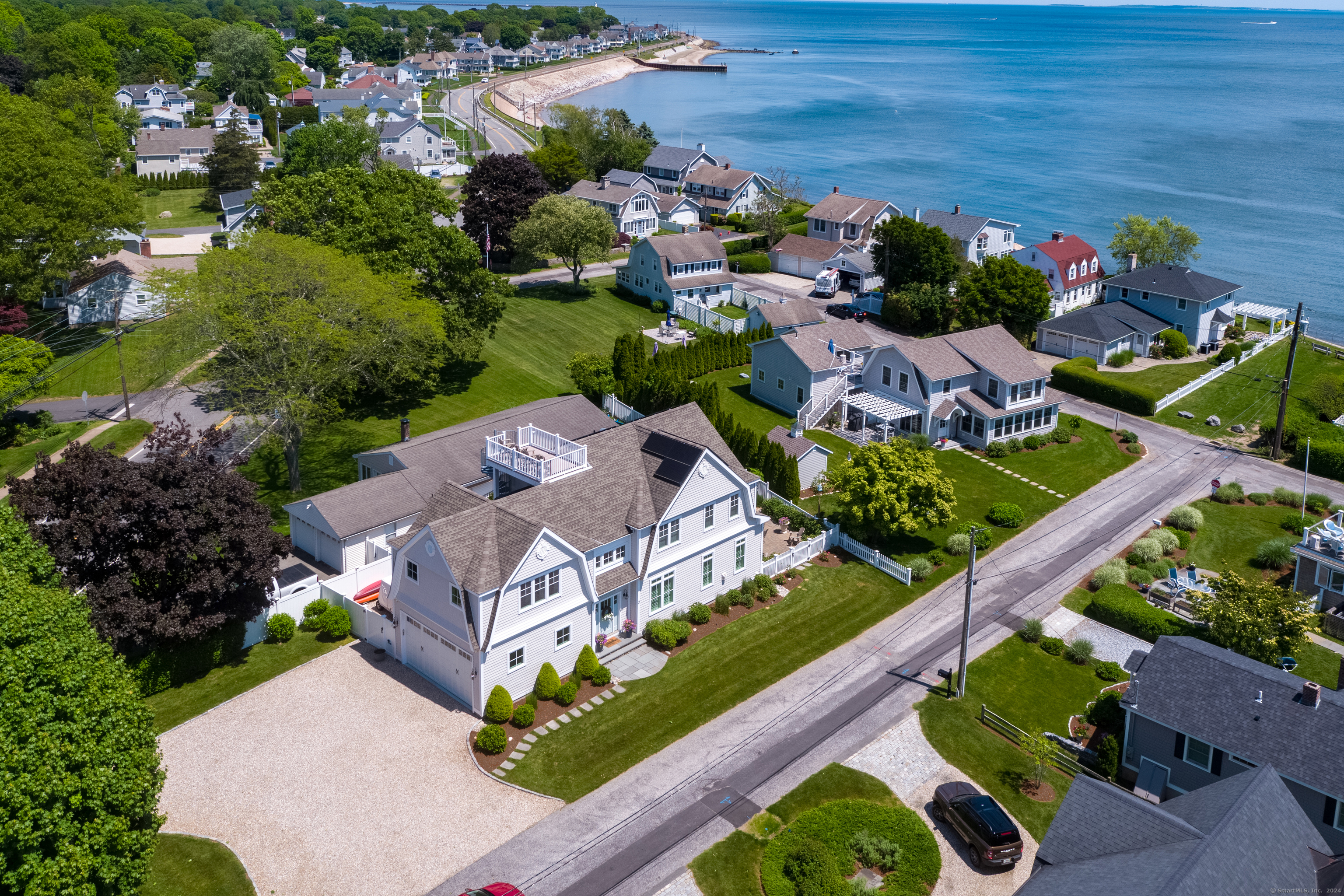 an aerial view of a house with a garden