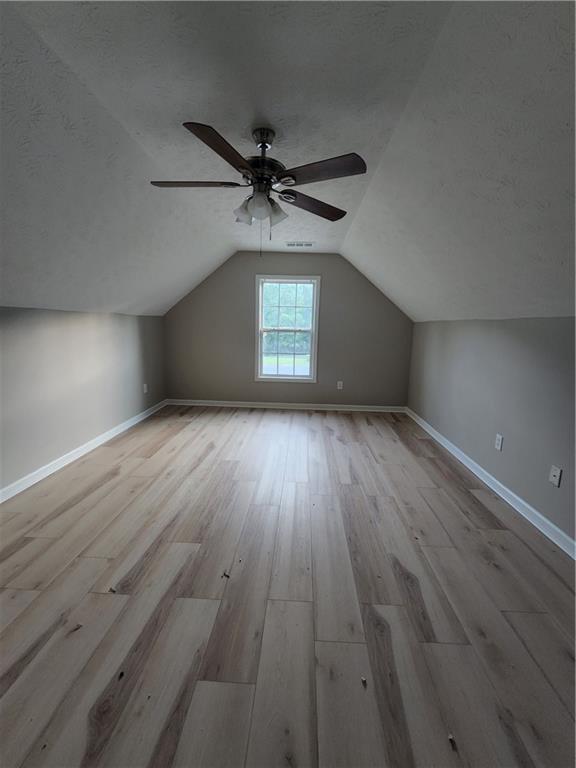 435 Butler Bridge Circle Covington, GA 30016 - Photo 5 of 25 wooden floor in an empty room