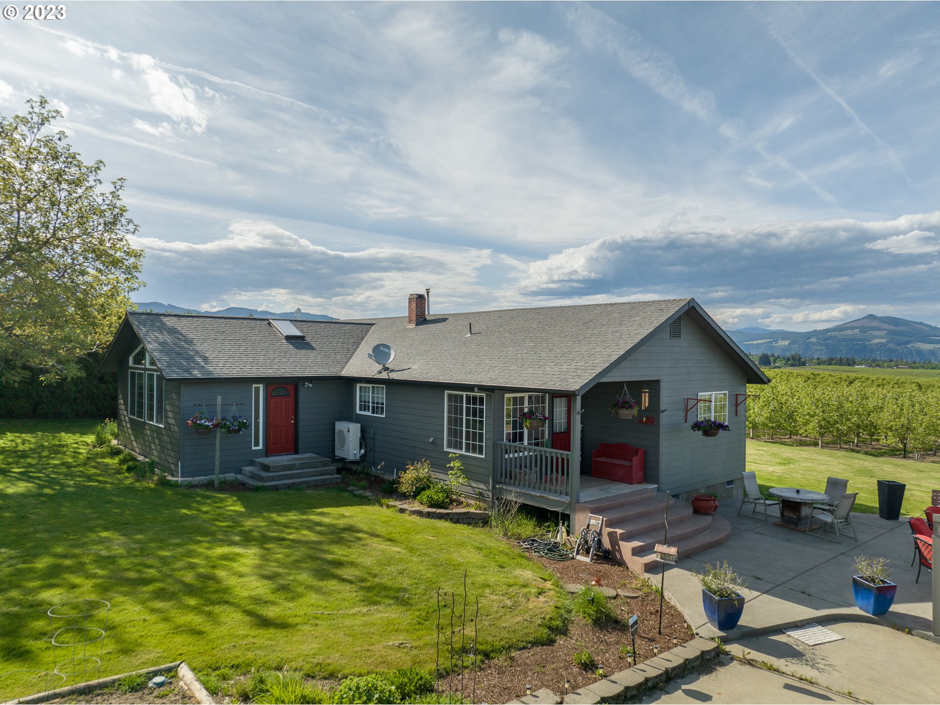 3476 Dethman Ridge Road Hood River, OR 97031 - Photo 2 of 22 an aerial view of a house with swimming pool garden and patio