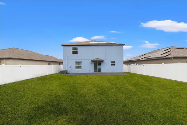 a house view with a outdoor space