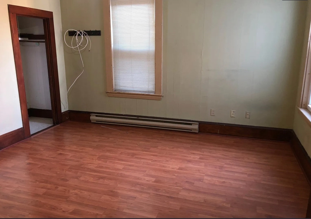 3 Elm Street, Unit 2 Framingham, MA 01701 - Photo 10 of 29 an empty room with windows