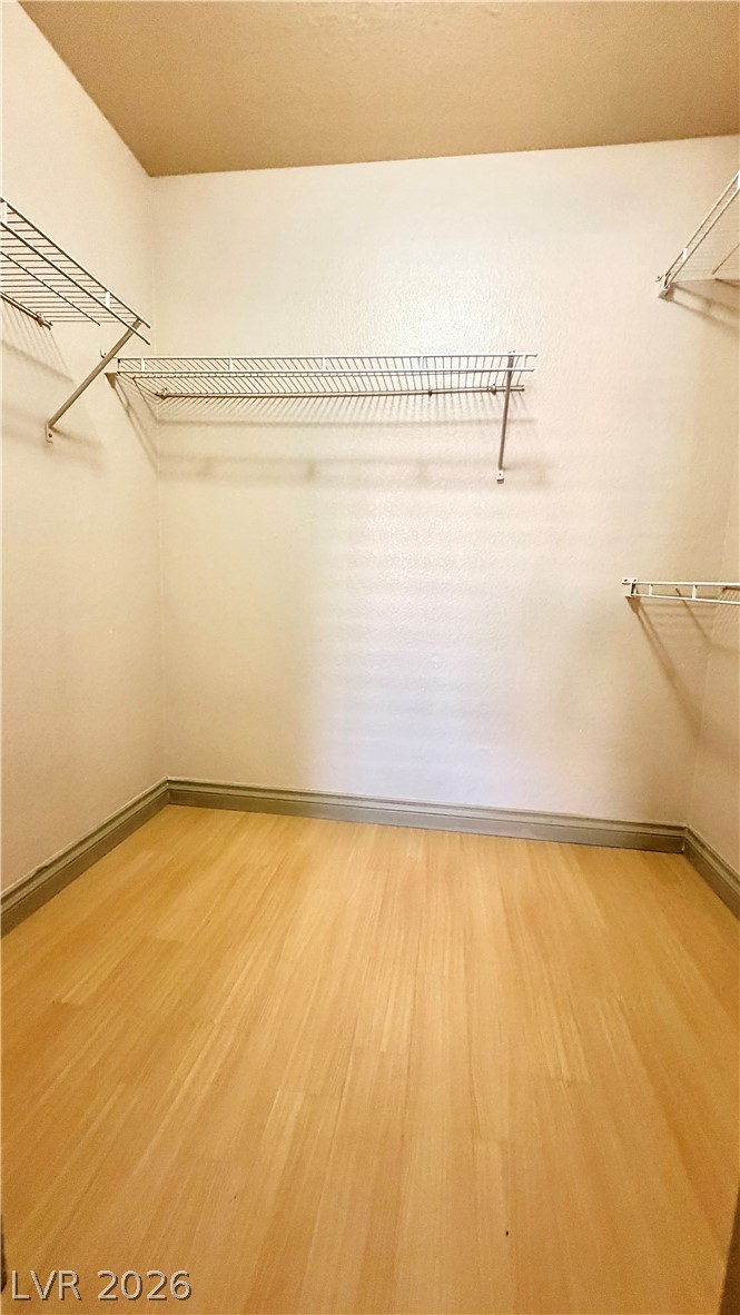 8101 West Flamingo Road, Unit 1082 Las Vegas, NV 89147 - Photo 21 of 23 Ample storage solutions await in this naturally illuminated closet.