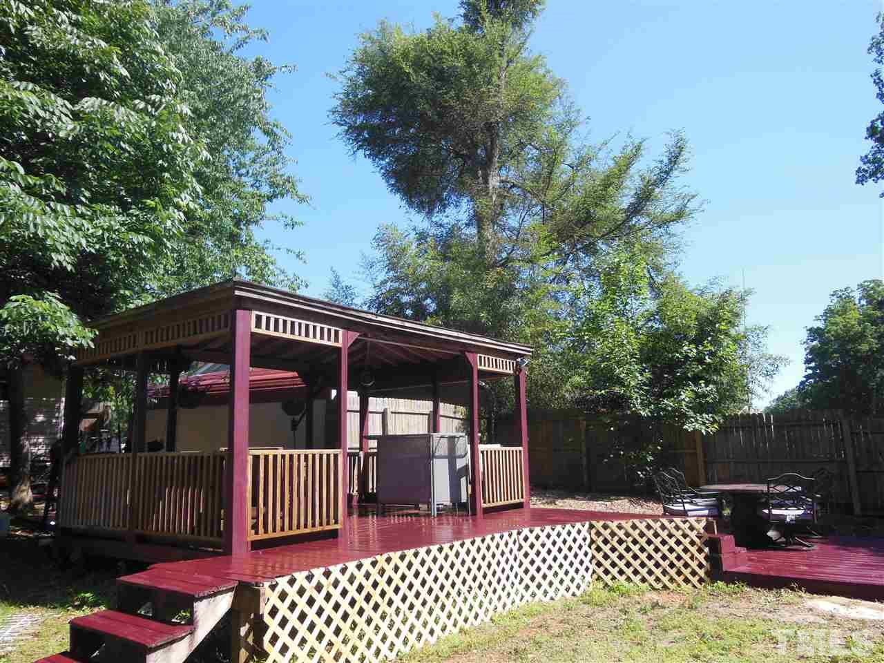 1125 Marlborough Road Raleigh, NC 27610 - Photo 21 of 23 a view of a street with an outdoor seating