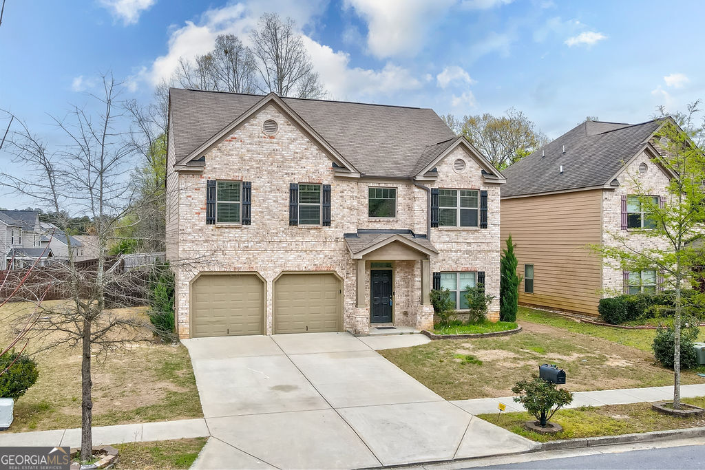 3495 Zaks Way Bethlehem, GA 30620 - Photo 3 of 40 a front view of a house with a yard
