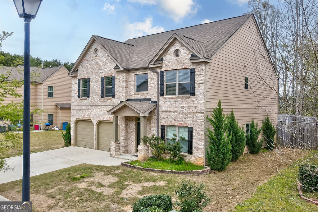 3495 Zaks Way Bethlehem, GA 30620 - Photo 4 of 40 a front view of a house with a yard