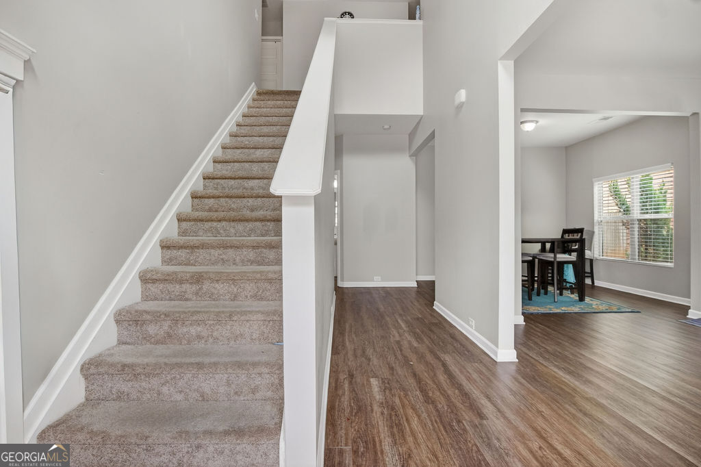 3495 Zaks Way Bethlehem, GA 30620 - Photo 5 of 40 a view of an entryway with wooden floor