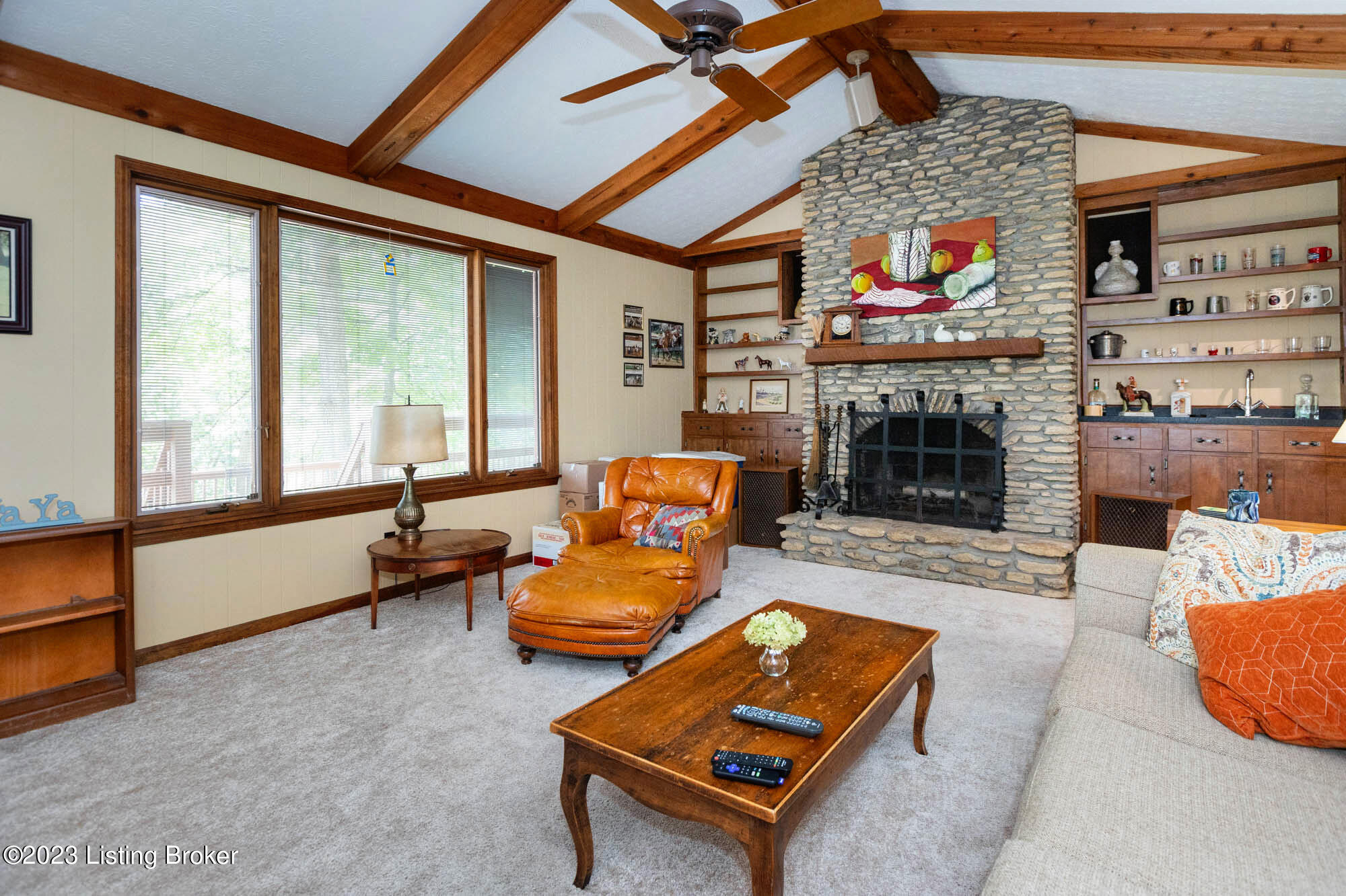 Vaulted Great Room with creek stone fireplace