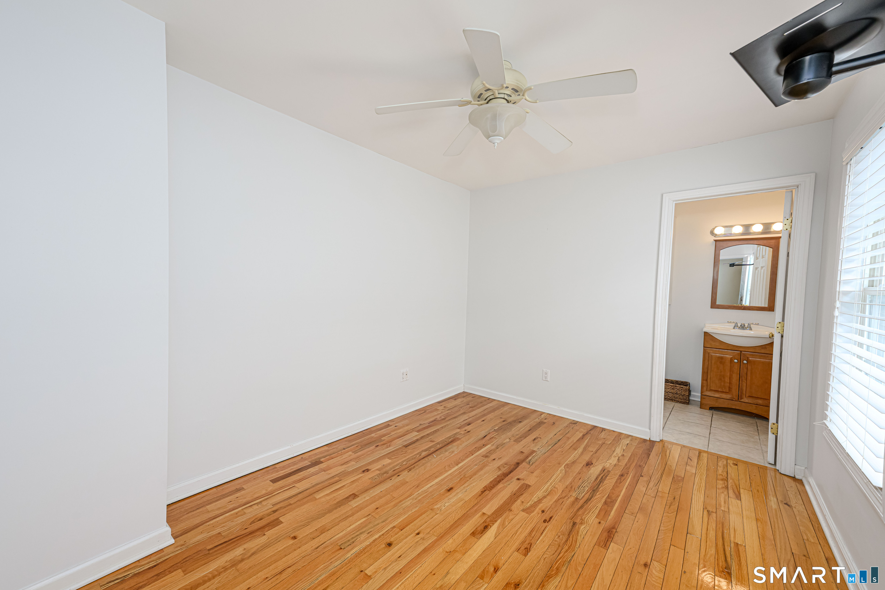 58 Minor Road East Haven, CT 06512 - Photo 22 of 40 En Suite through door on right