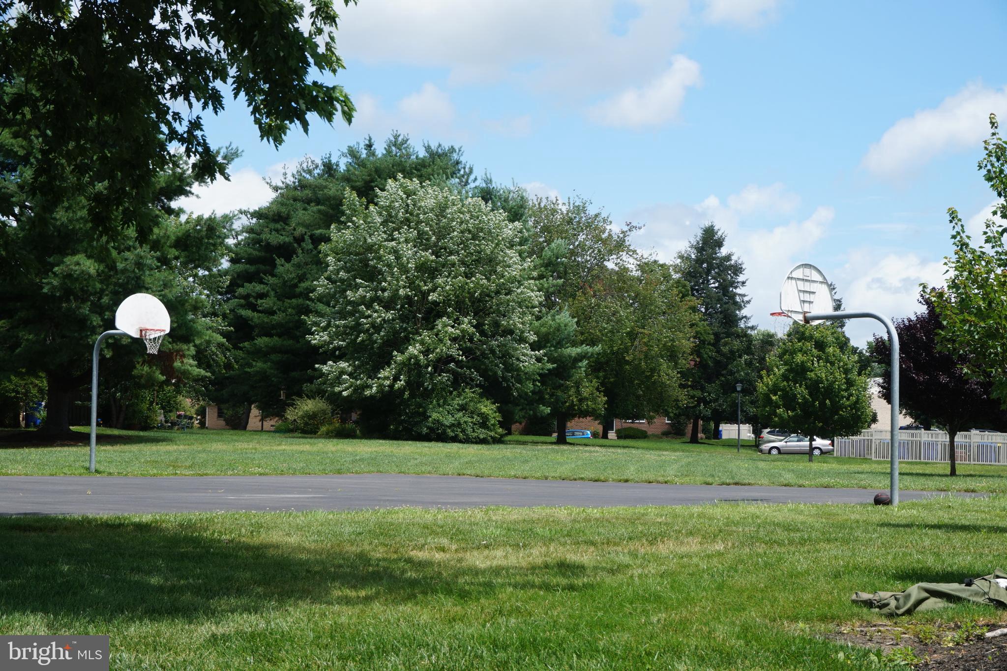 134 Eaves Mill Road Medford, NJ 08055 - Photo 14 of 17 Sunny day at the neighborhood basketball court.