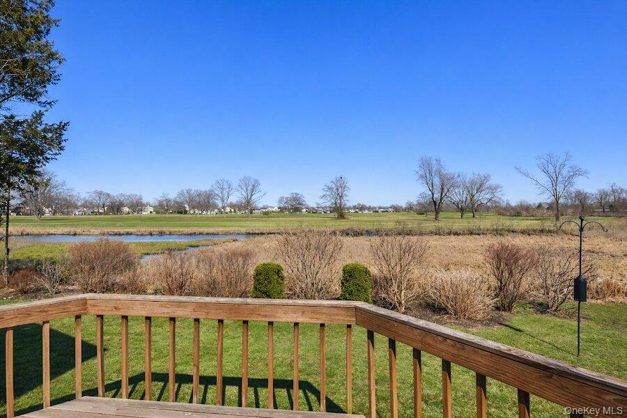 3421 Turf Road Oceanside, NY 11572 - Photo 6 of 50 a view of a lake with a mountain in the background