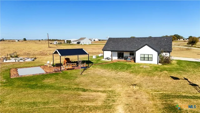 a view of a swimming pool and an ocean view
