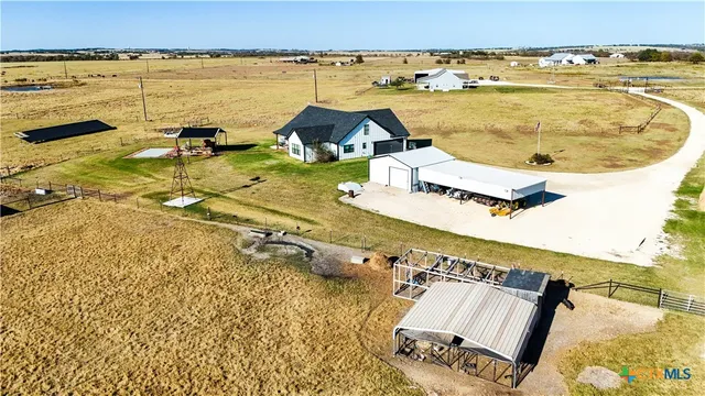 a view of a swimming pool and lounge chair