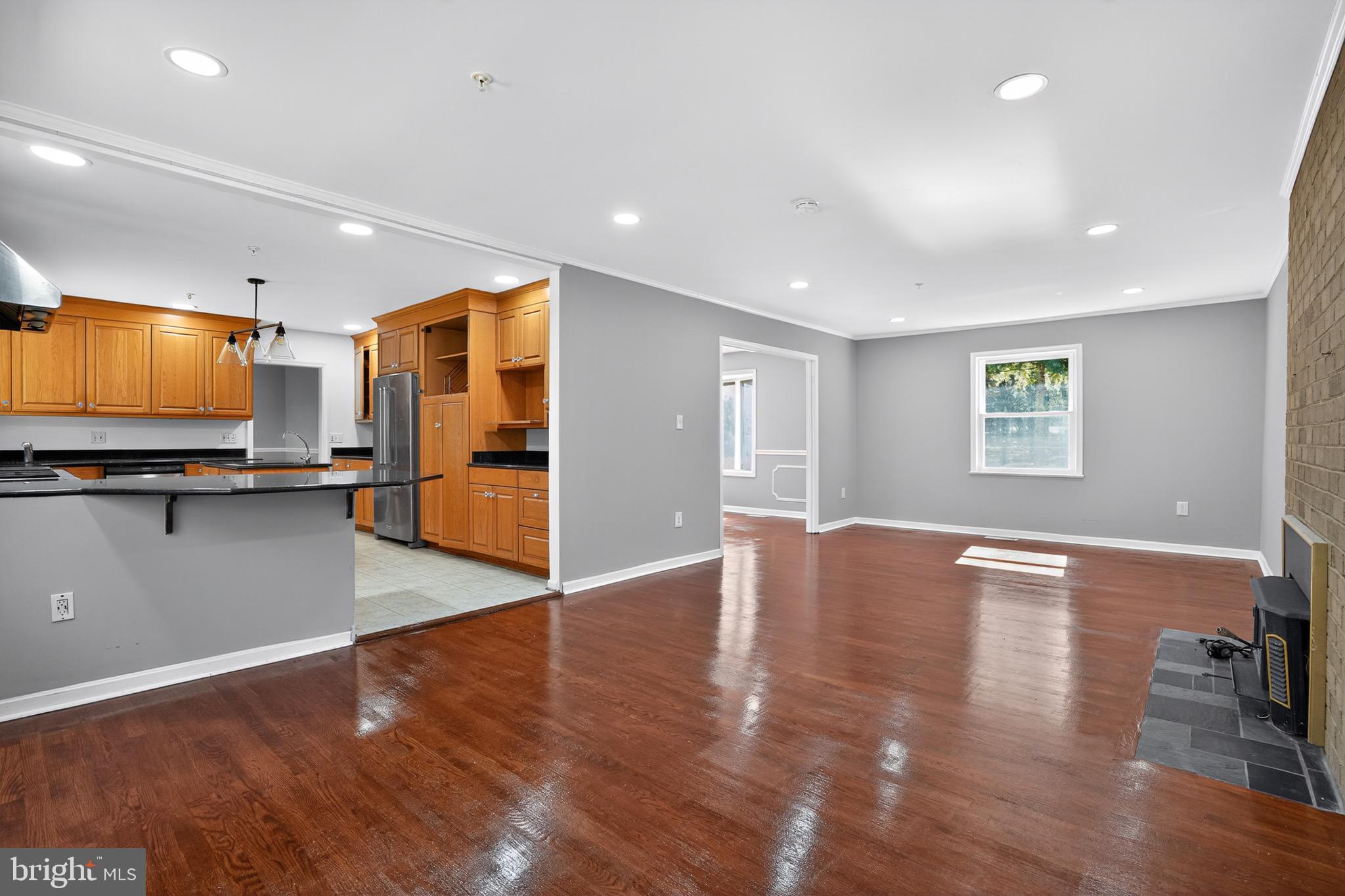 11308 Chantilly Lane Bowie, MD 20721 - Photo 25 of 30 a view of a kitchen with a sink and a stove top oven