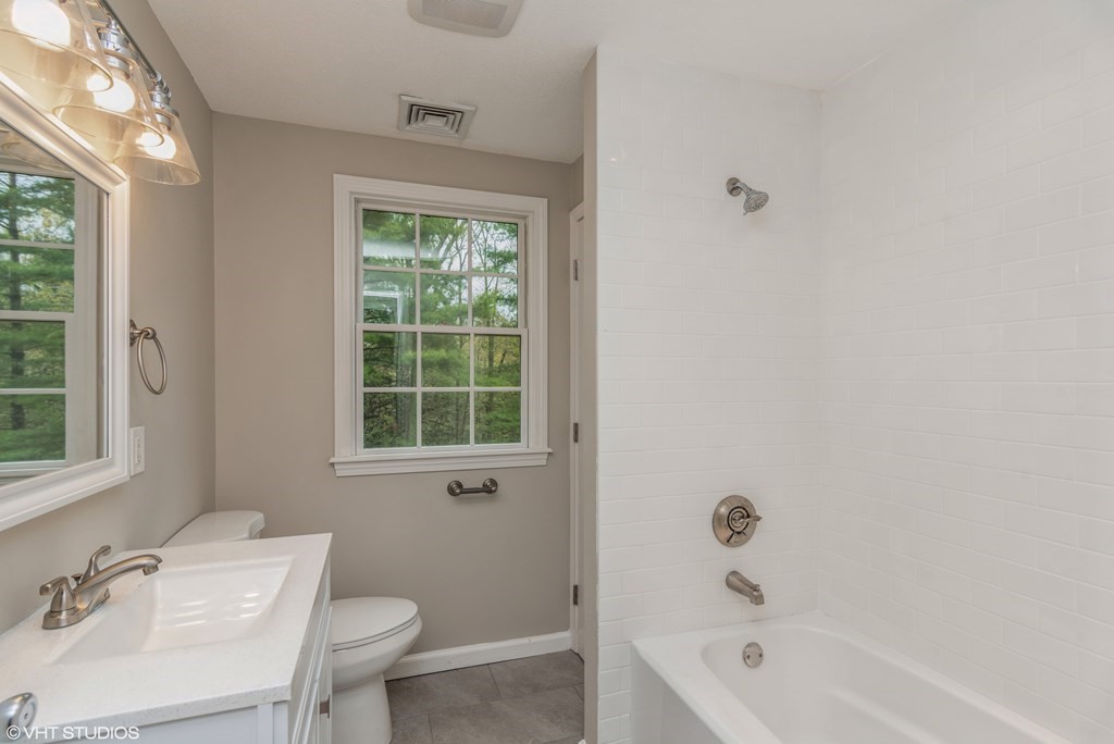 106 Martin Farms Road Hampden, MA 01036 - Photo 22 of 34 a bathroom with a sink a toilet and shower