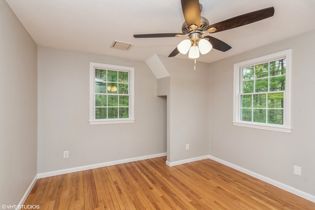 106 Martin Farms Road Hampden, MA 01036 - Photo 24 of 34 wooden floor in an empty room with a window