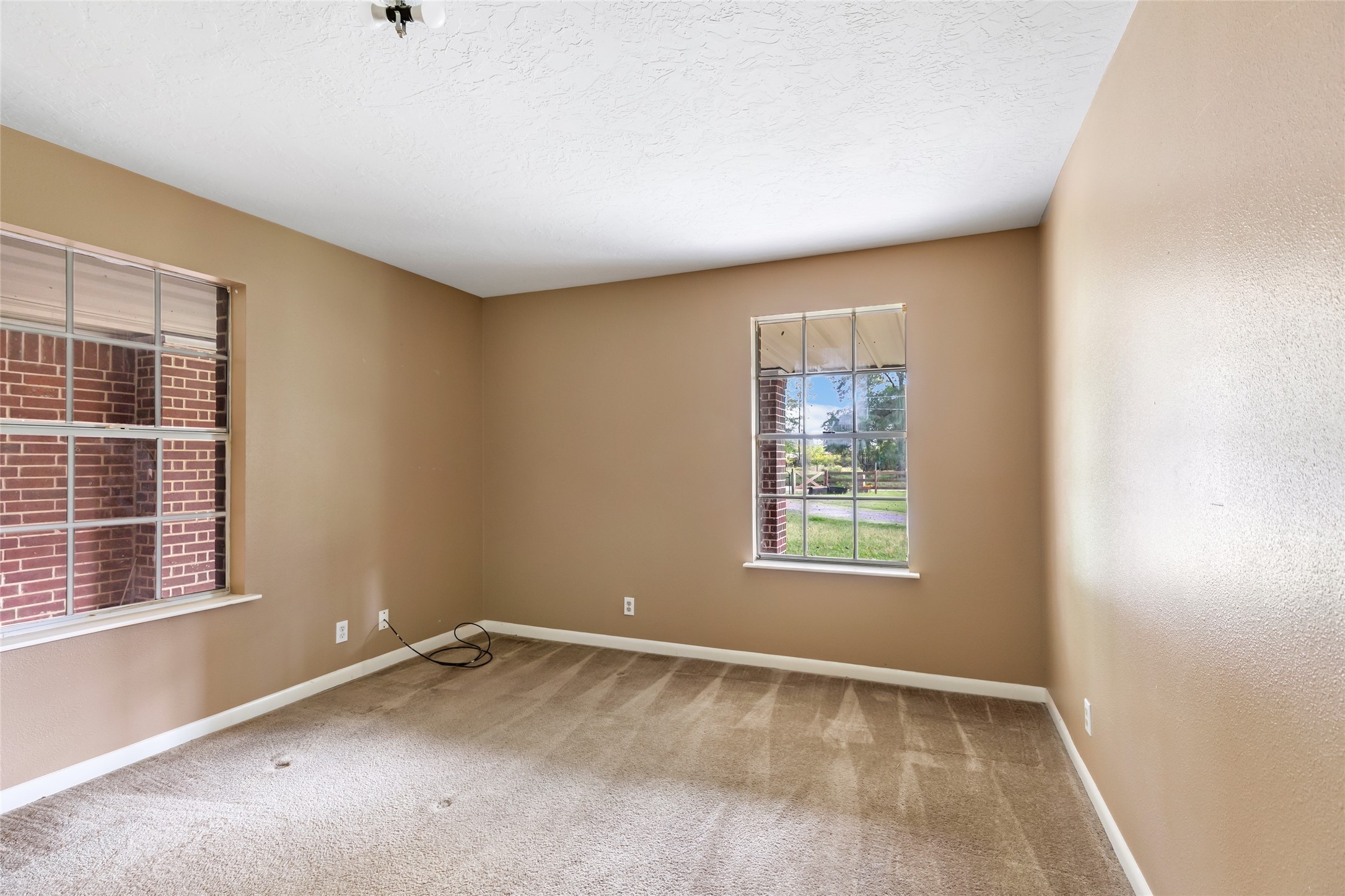 27311 Kingport Drive Splendora, TX 77372 - Photo 17 of 26 an empty room with a window