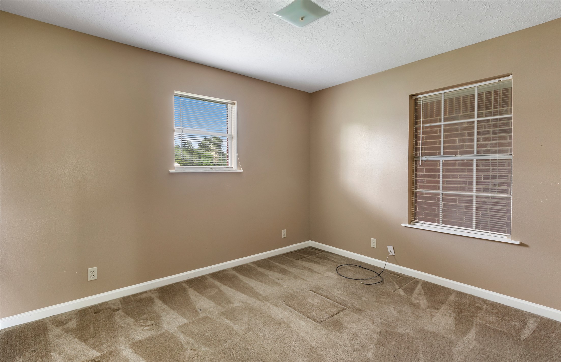 27311 Kingport Drive Splendora, TX 77372 - Photo 18 of 26 an empty room with a window