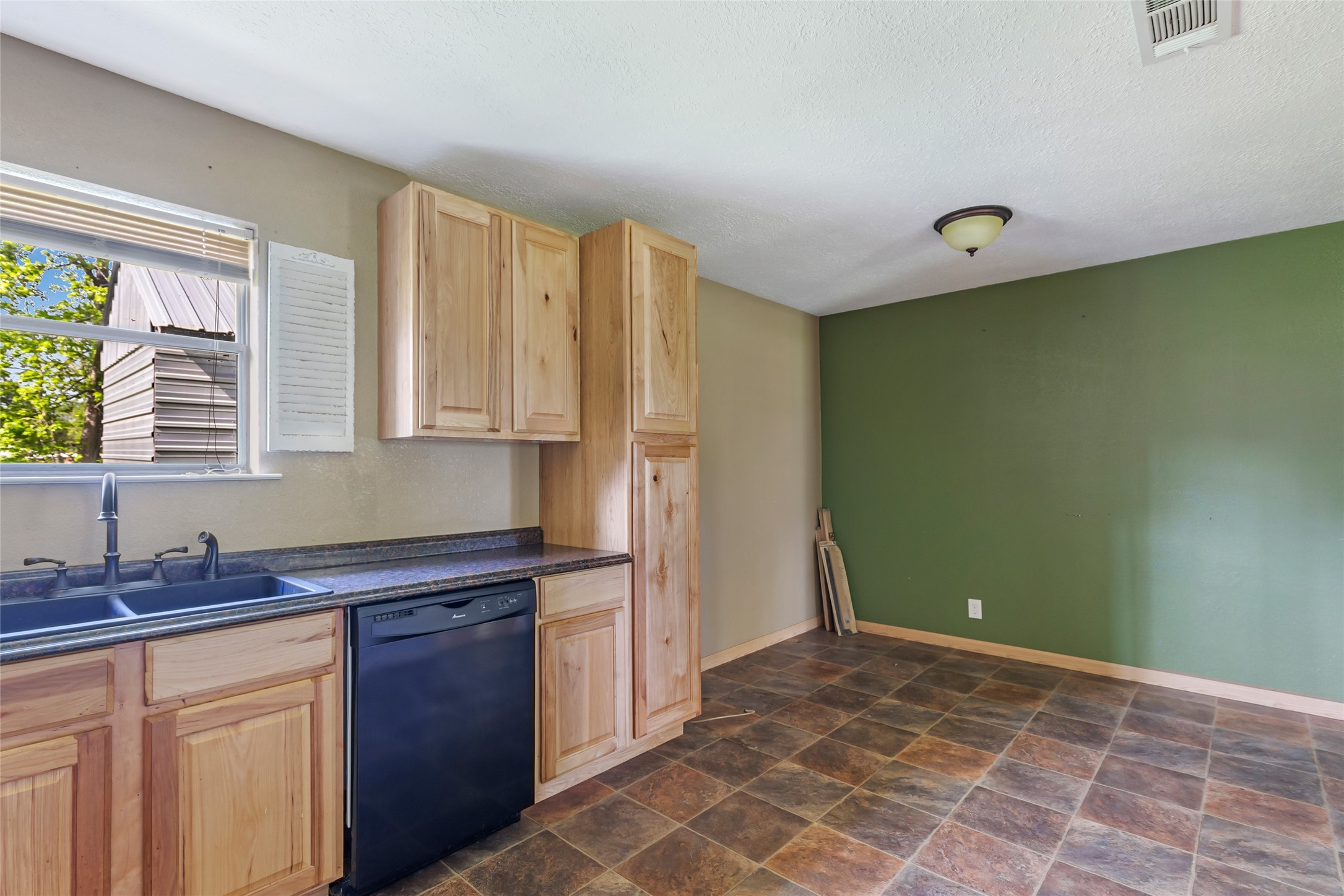 27311 Kingport Drive Splendora, TX 77372 - Photo 21 of 26 a bathroom with a sink and a mirror