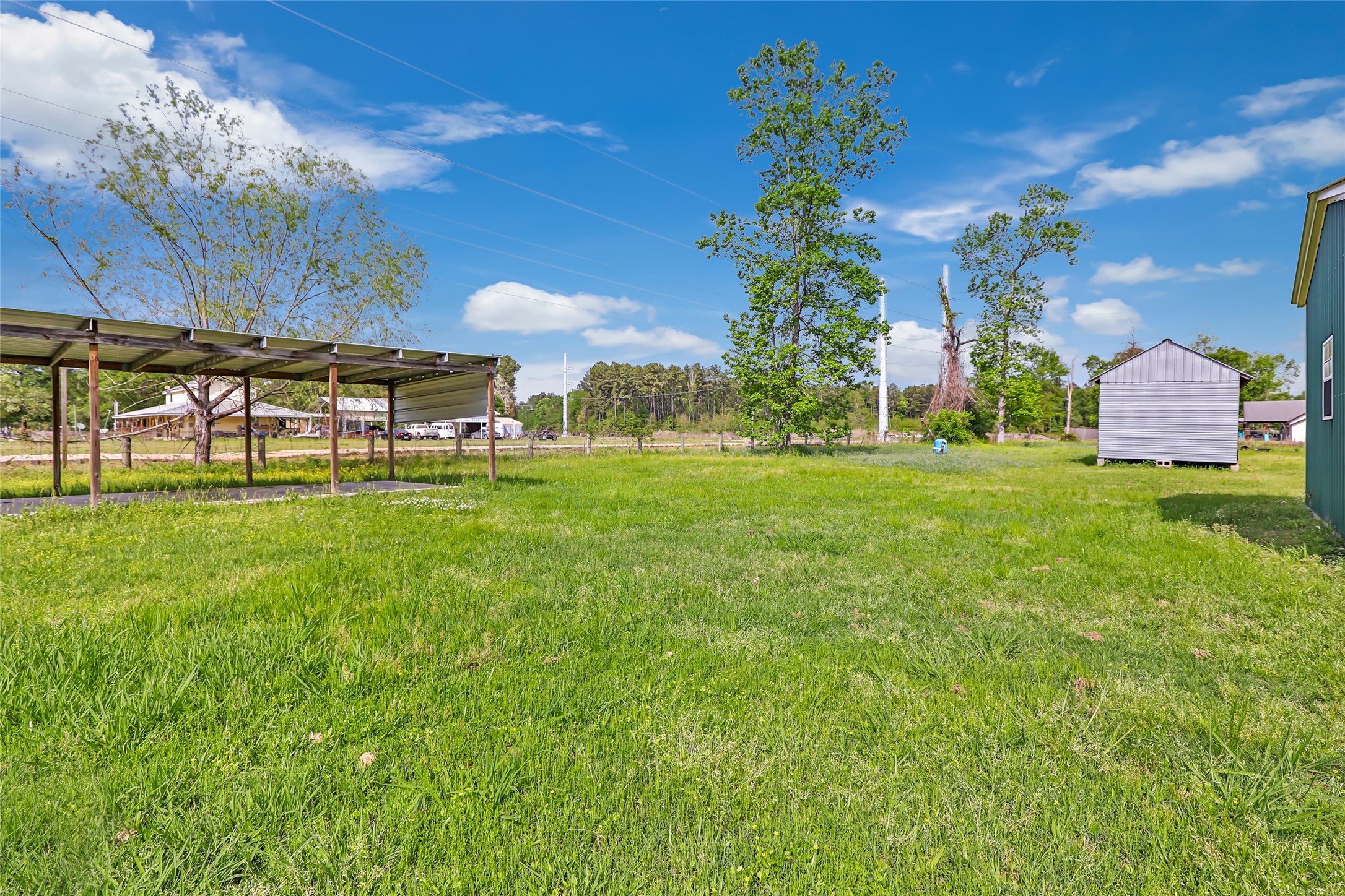 27311 Kingport Drive Splendora, TX 77372 - Photo 6 of 26 a view of a house with a yard