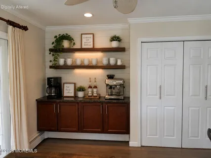 a view of cabinets and wooden floor