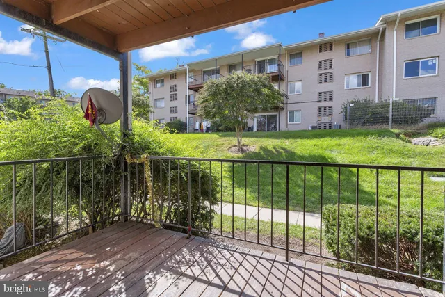 a view of a garden with a lake view