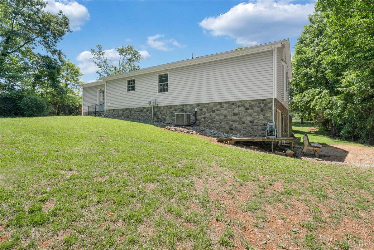 1124 Homeplace Road Bedford, VA 24523 - Photo 36 of 47 a backyard of a house with lots of green space