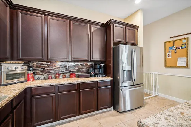 $960,000 | 5437 Southwest Honeysuckle Court, Palm City, FL 34990