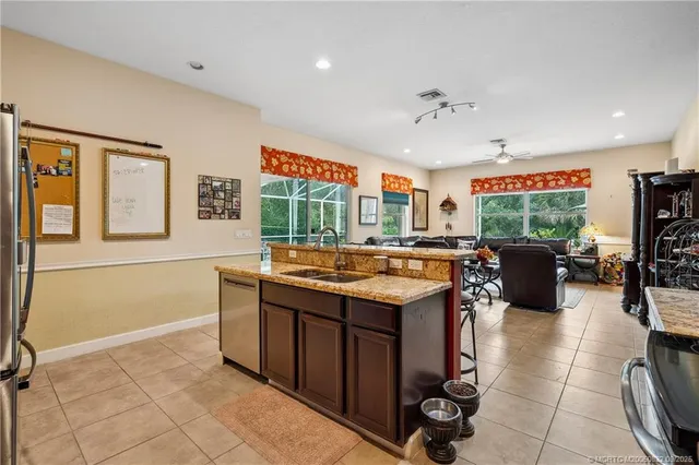 $960,000 | 5437 Southwest Honeysuckle Court, Palm City, FL 34990