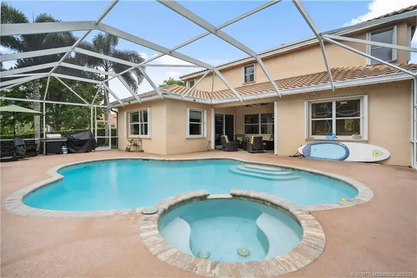 $935,000 | 5437 Southwest Honeysuckle Court, Palm City, FL 34990