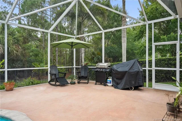$960,000 | 5437 Southwest Honeysuckle Court, Palm City, FL 34990