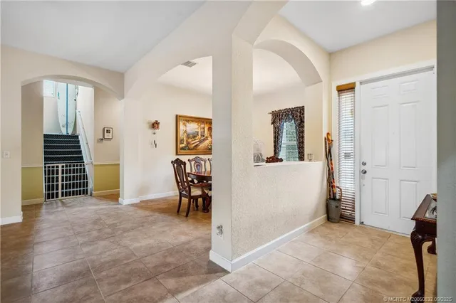 $960,000 | 5437 Southwest Honeysuckle Court, Palm City, FL 34990
