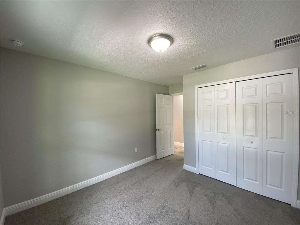 15298 Southwest 43rd Court Ocala, FL 34473 - Photo 15 of 26 an empty room with closet area