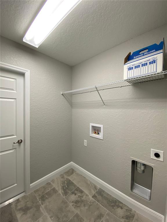 15298 Southwest 43rd Court Ocala, FL 34473 - Photo 24 of 26 a view of a closet area with racks on the wall
