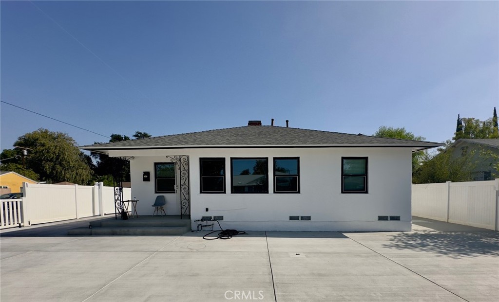 7454 Gaviota Avenue Van Nuys, CA 91406 - Photo 1 of 11 a front view of a house with a yard and garage