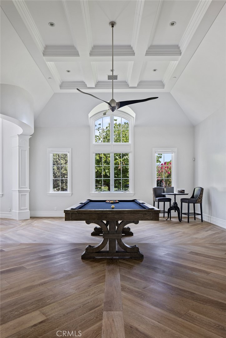 24100 Hidden Ridge Road Hidden Hills, CA 91302 - Photo 12 of 15 a living room with furniture and floor to ceiling window